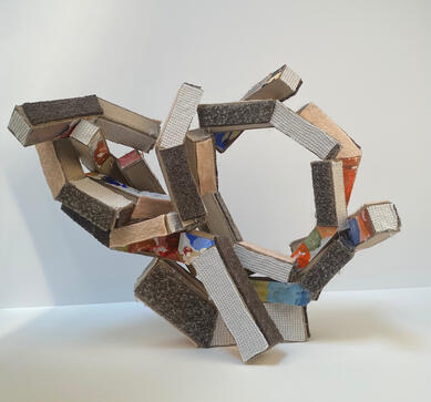 Embrace, chipboard, felted wool, thermal shirt, wax paper canvas, hot glue, 2024